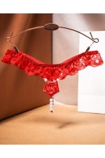 String dentelle rose à volants et perles